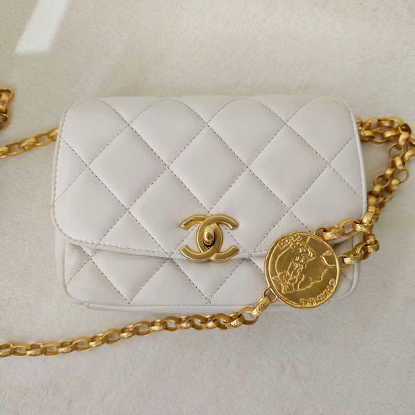Chanel small quilted white lambskin flap bag