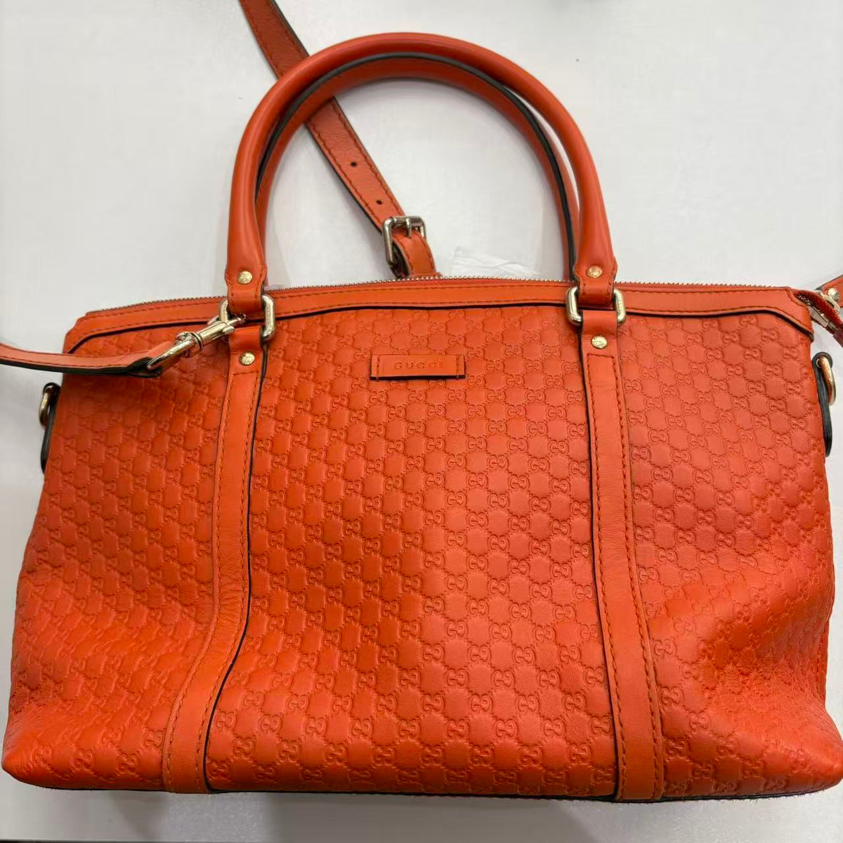 Gucci orange handle bag
