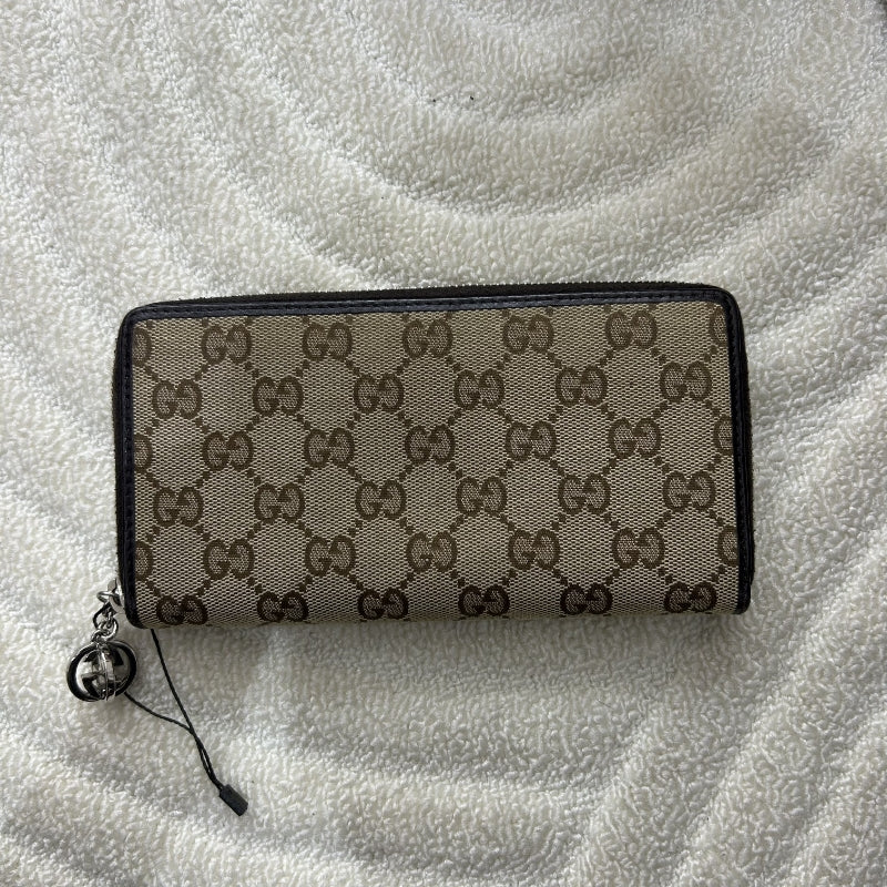 GUCCl Monogram Metal Bar Zip
