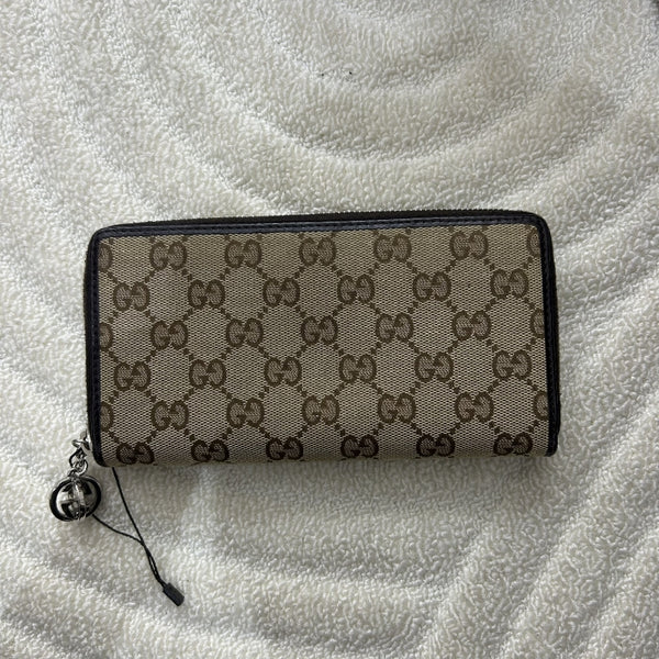 GUCCl Monogram Metal Bar Zip
