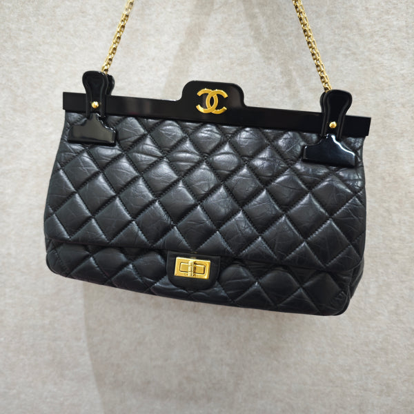 Chanel 2.55 Reissue Flap Bag in black leather