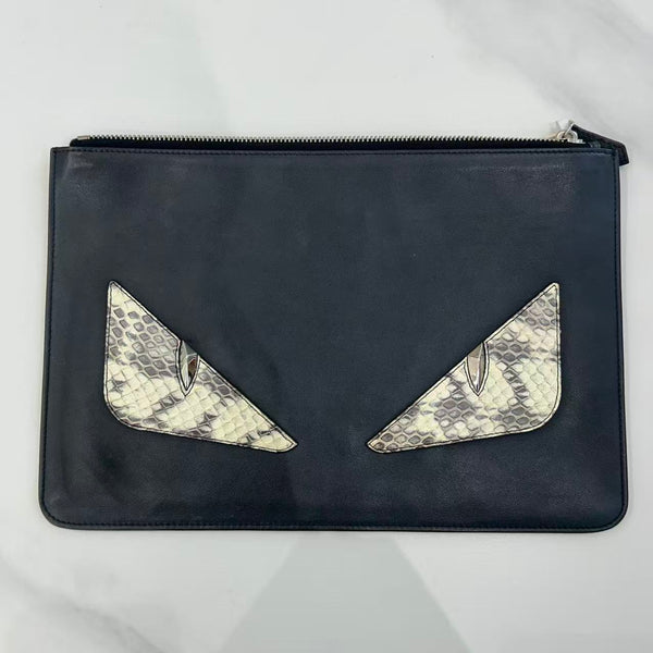 Fendi Bugs Eye Monster python leather clutch bag in black