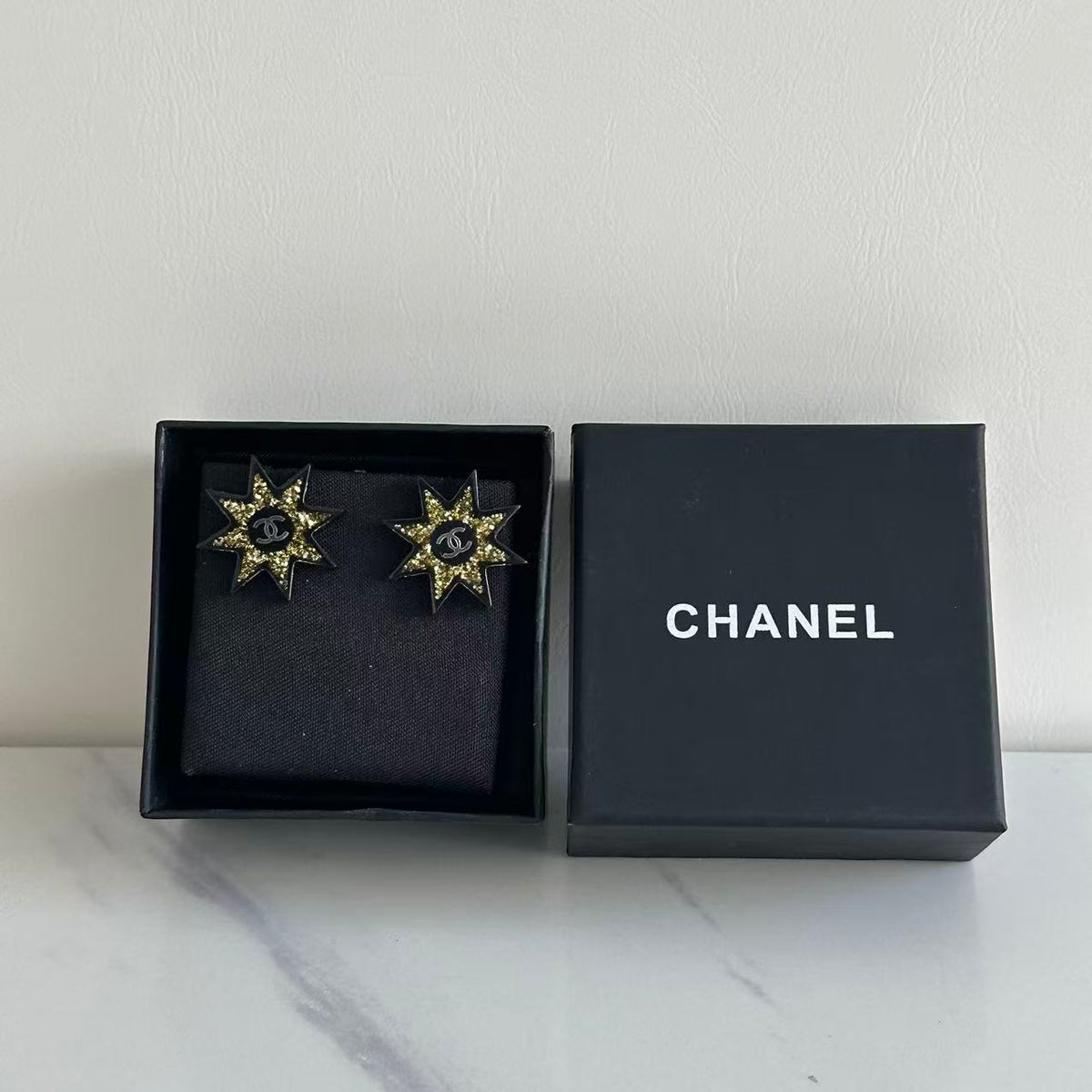 CHANEL Resin Metal CC Star Earrings Black Gold